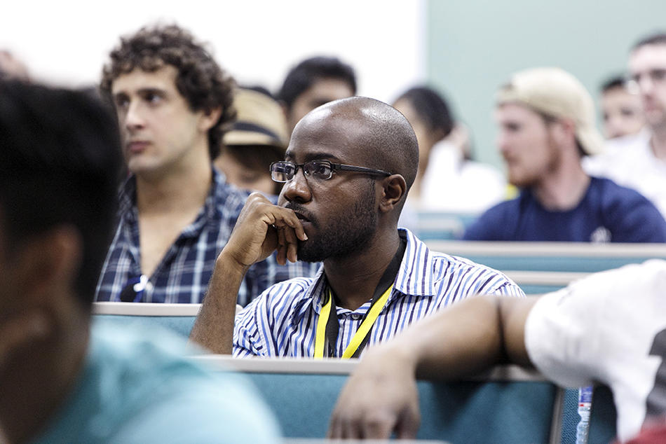 Group of students listening in lecture hall