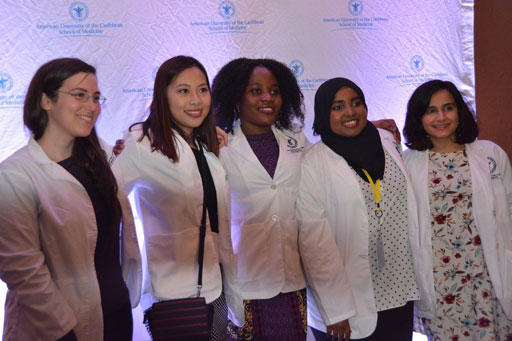 Group of students in white coats