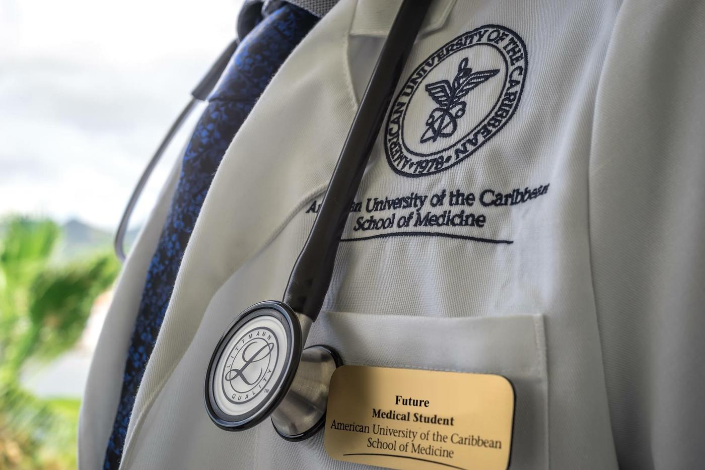 Close up view of AUC white coat and stethoscope 