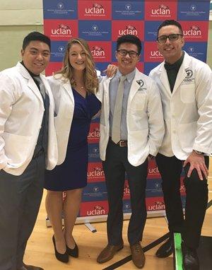 Group of students in white coats